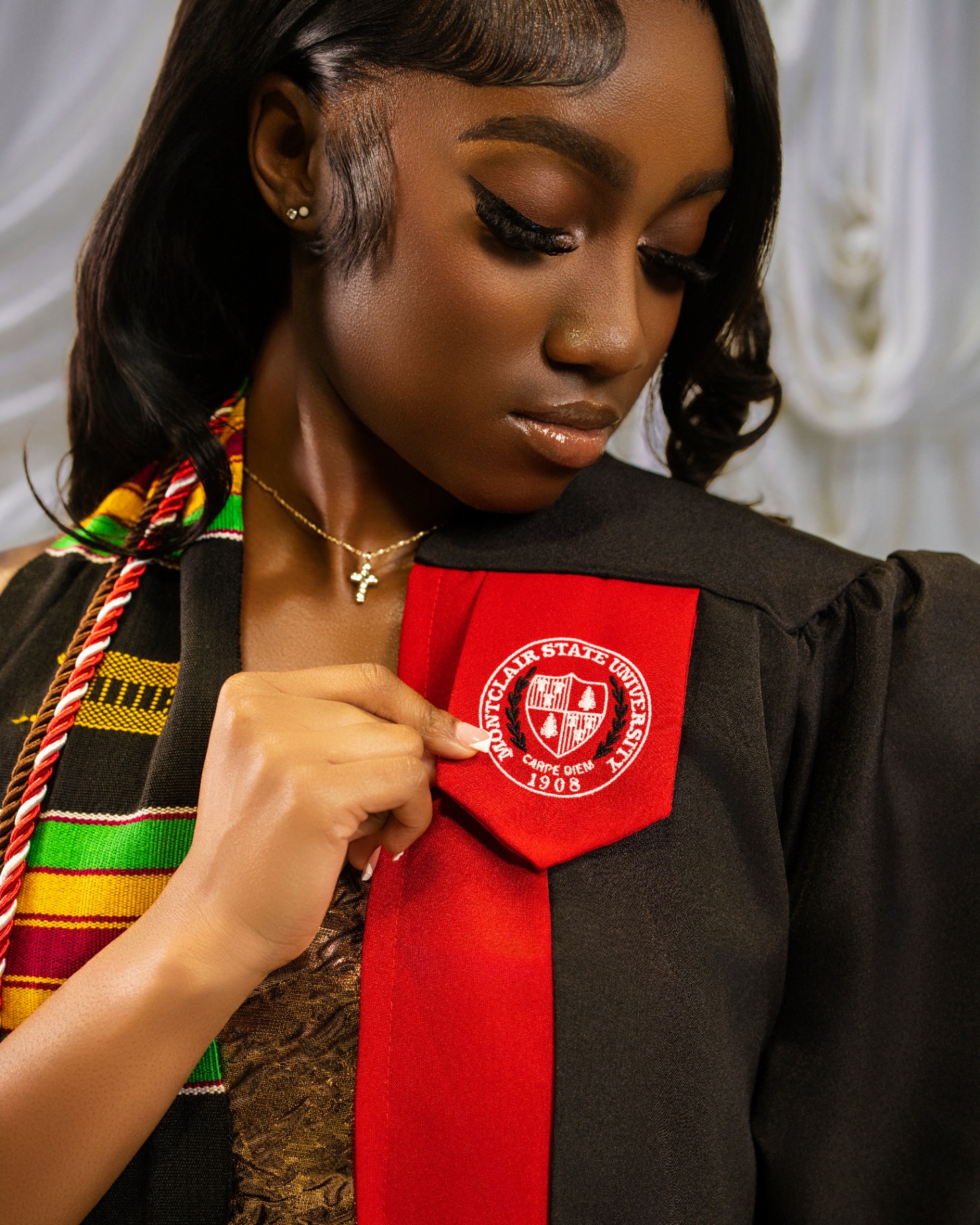 Close-up of Montclair State grad with kente stole