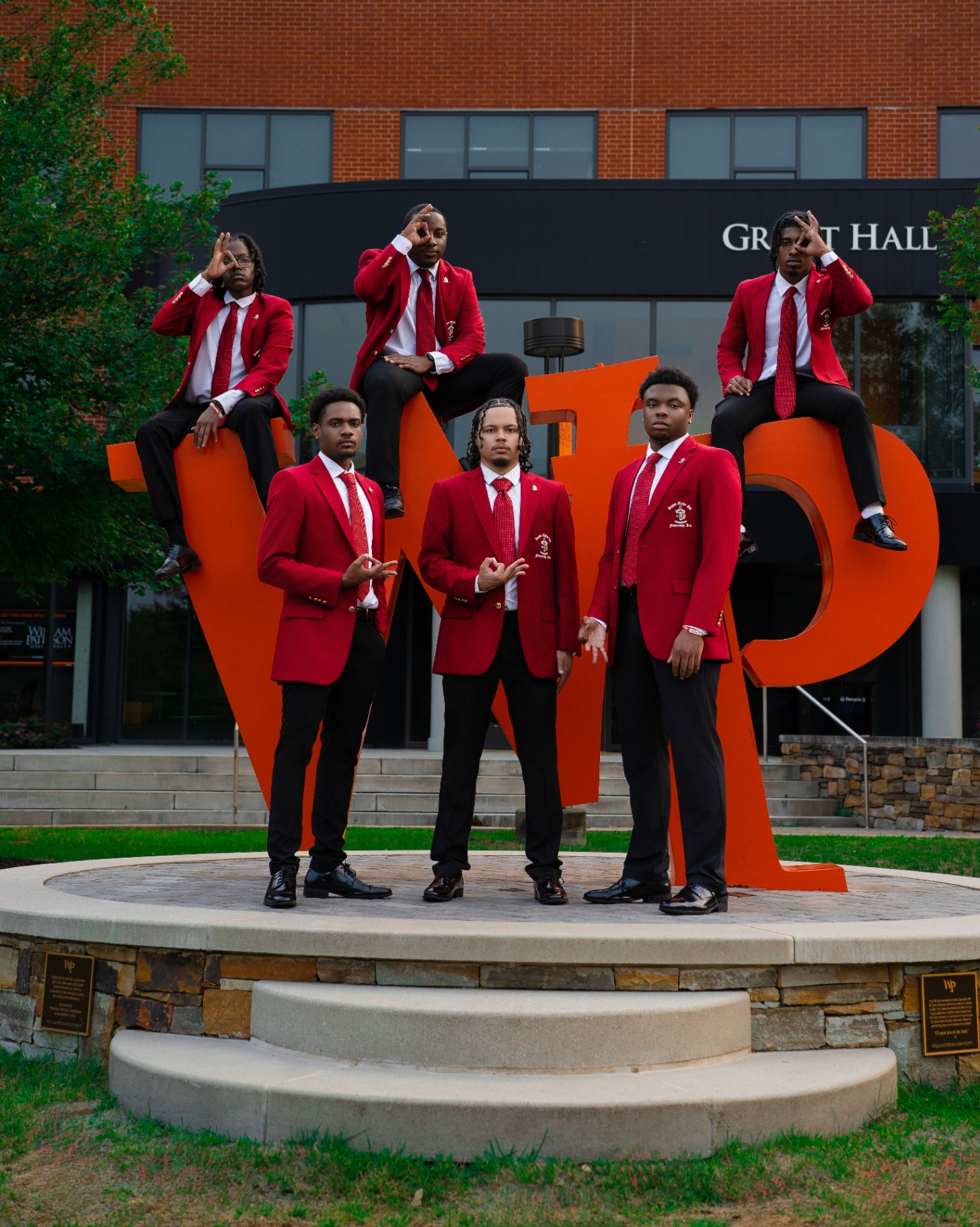 Men's fraternity group portrait at WP letters