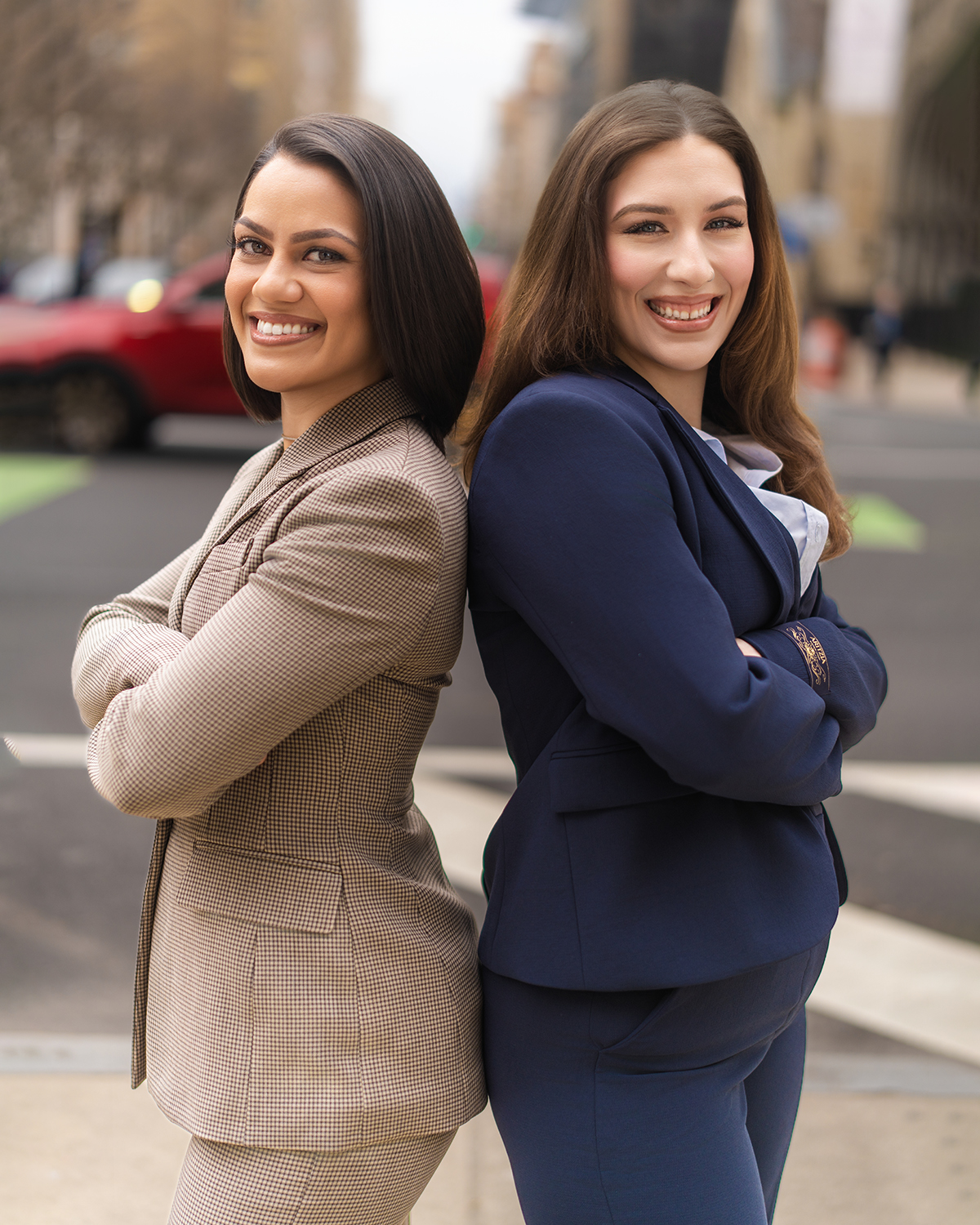 Business duo back-to-back on NYC street
