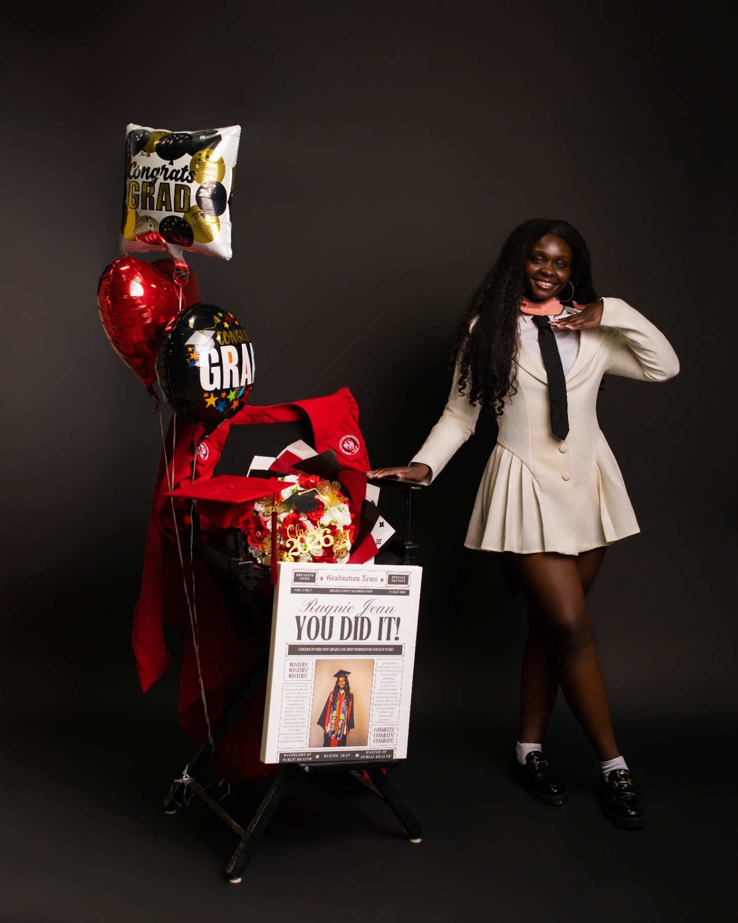Graduation newspaper studio setup with balloons