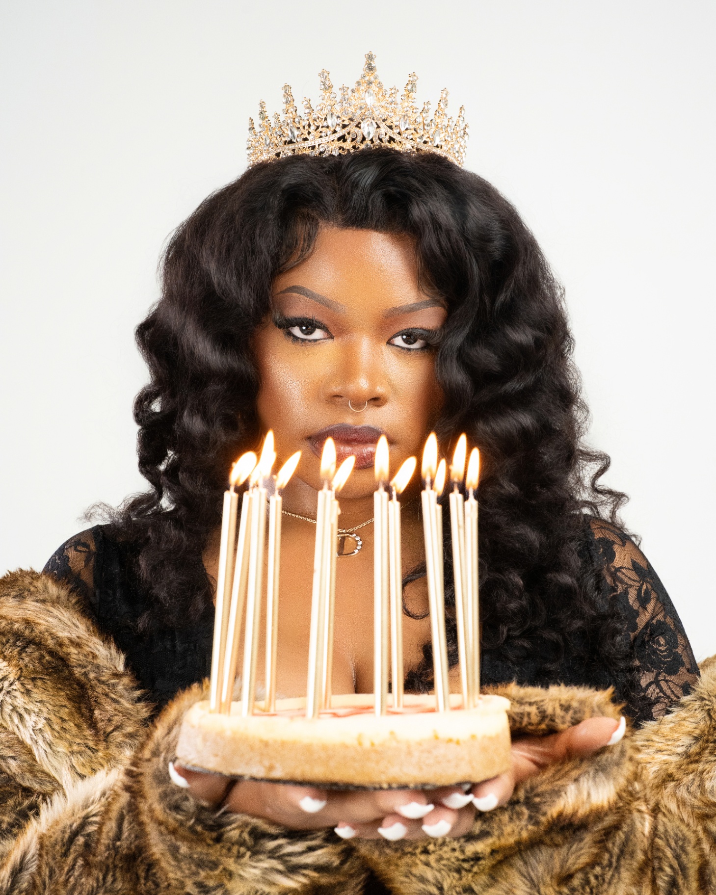 Crown and birthday candles studio portrait